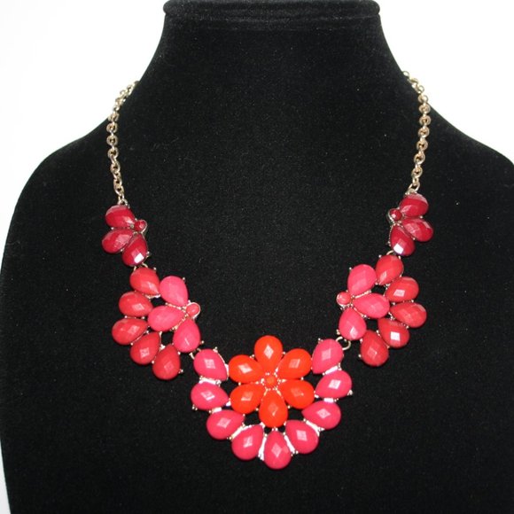 Beautiful gold and red flower bib style necklace